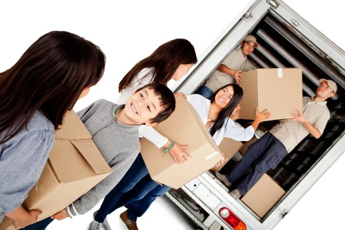 Man and van loading furniture in Hampstead on a clear local move