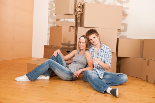 Removal van and moving boxes in a Hampstead residential street