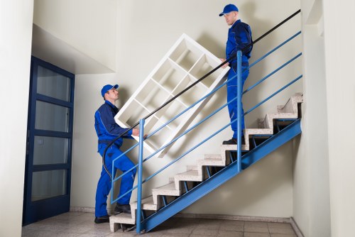 Professional movers assisting with transport and unloading in Hampstead