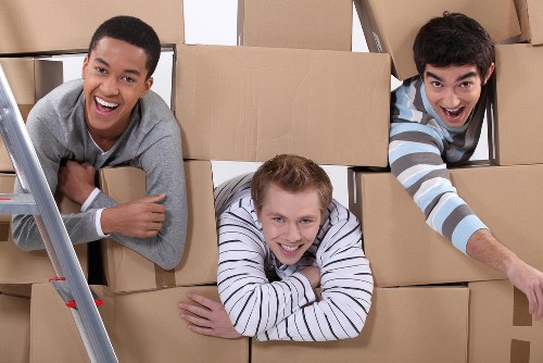 Furniture collection and transport by a Hampstead moving van