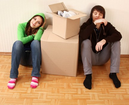 Moving team unloading household items at a Hampstead address