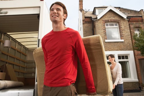 Careful loading of unwanted furniture for local collection