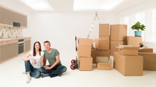Professional movers handling furniture in Hampstead