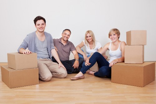 Local removals crew handling furniture in Hampstead