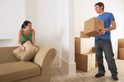 Removals crew loading items carefully near Hampstead Hill